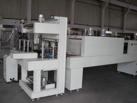 Máquina caliente auto de la película de encogimiento de la empaquetadora para el ANIMAL DOMÉSTICO/la botella plástica, control del PLC
